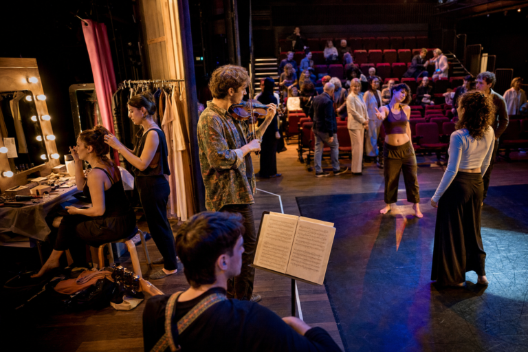 Independent performers rehearsing backstage at a small Sydney theatre