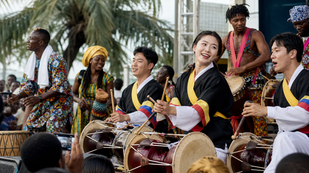 Nigerian and Korean percussionists performing together at a Lagos cultural festival
