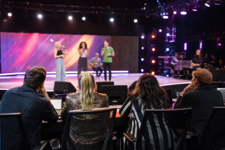 Singers rehearsing on an Australian television talent-show stage